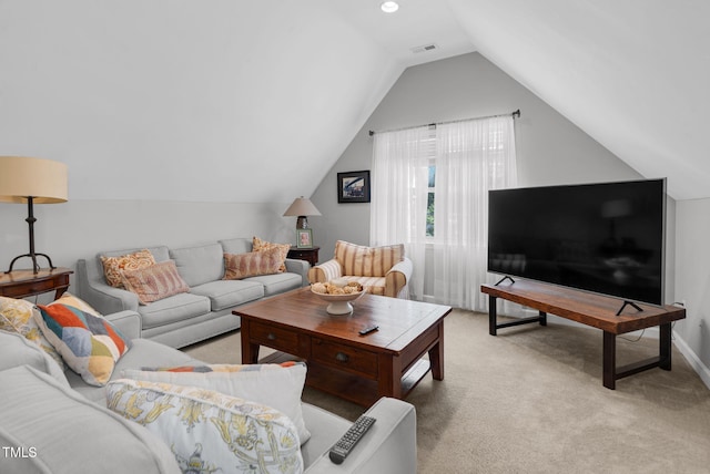 200 Holly Branch Dr, Holly Springs, NC 27540 - living room featuring light colored carpet and vaulted ceiling