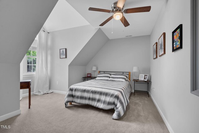 200 Holly Branch Dr, Holly Springs, NC 27540 - carpeted bedroom with vaulted ceiling and ceiling fan