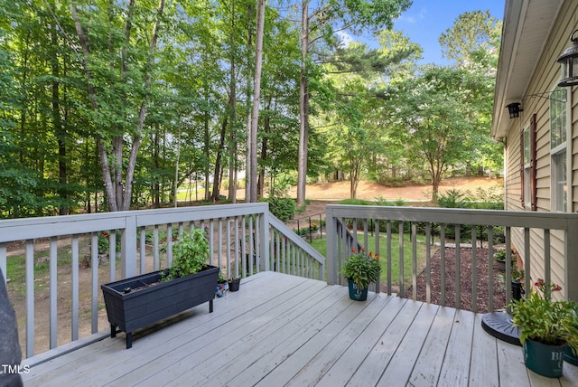 200 Holly Branch Dr, Holly Springs, NC 27540 - deck featuring view of wooded area
