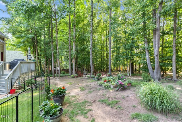 200 Holly Branch Dr, Holly Springs, NC 27540 - view of yard with stairs and a wooden deck