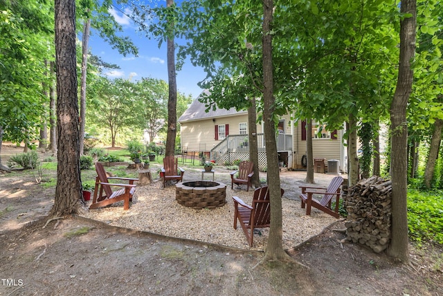 200 Holly Branch Dr, Holly Springs, NC 27540 - view of patio with an outdoor fire pit