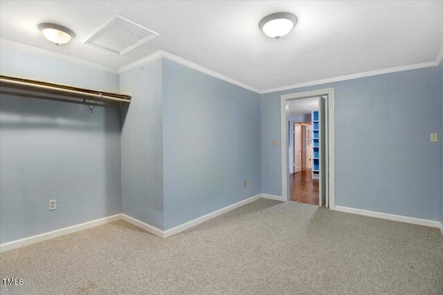 125 W Pine St, Pine Level, NC 27568 - unfurnished bedroom featuring carpet floors, attic access, crown molding, and baseboards
