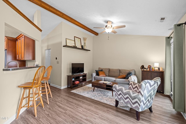 5801 Hadrian Dr, Durham, NC 27703 - living area with a ceiling fan and light wood finished floors