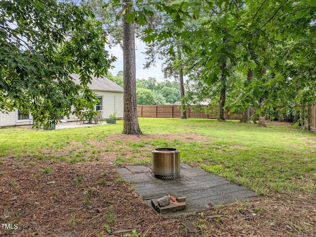 5801 Hadrian Dr, Durham, NC 27703 - fenced backyard with a patio area