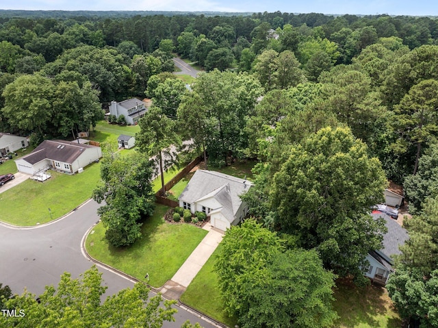 5801 Hadrian Dr, Durham, NC 27703 - aerial view of residential area with a forest