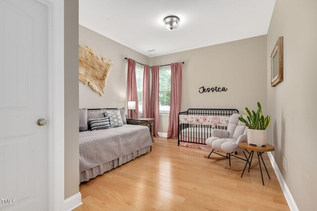 5637 Garnet Meadow Rd, Knightdale, NC 27545 - bedroom featuring light wood-style flooring