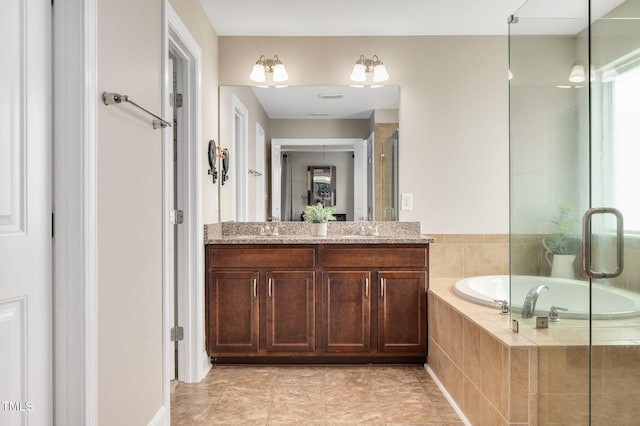 5637 Garnet Meadow Rd, Knightdale, NC 27545 - full bath featuring a garden tub, vanity, tile patterned flooring, and a shower with shower door