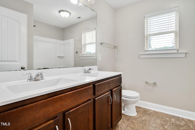 5637 Garnet Meadow Rd, Knightdale, NC 27545 - full bath with double vanity, a shower, and tile patterned flooring