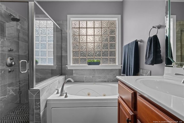 60 Rolling Pines Dr, Spring Lake, NC 28390 - bathroom with a shower stall, a whirlpool tub, and vanity