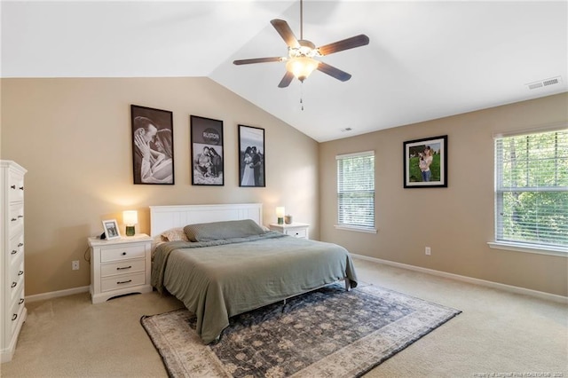 18 Hallow Oak St, Spring Lake, NC 28390 - bedroom featuring light carpet, lofted ceiling, multiple windows, baseboards, and ceiling fan