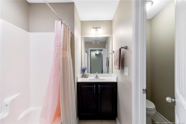18 Hallow Oak St, Spring Lake, NC 28390 - full bath featuring vanity, toilet, tile patterned flooring, and baseboards