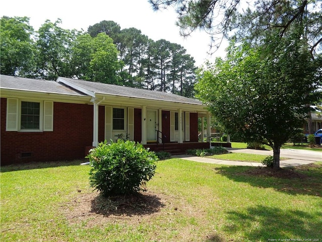 711 Fairview St, Fayetteville, NC 28312 - ranch-style house featuring a porch, crawl space, a front lawn, and brick siding