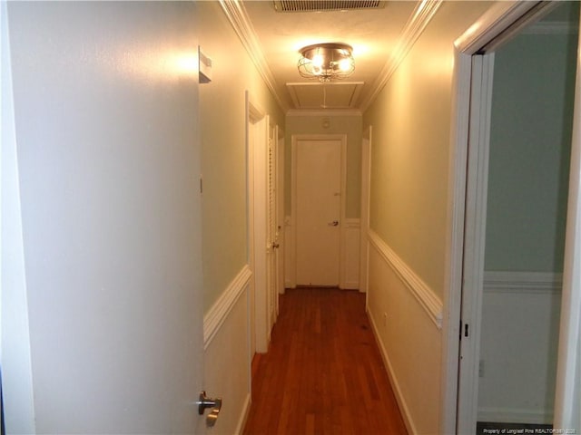 711 Fairview St, Fayetteville, NC 28312 - corridor with attic access, wood finished floors, and ornamental molding