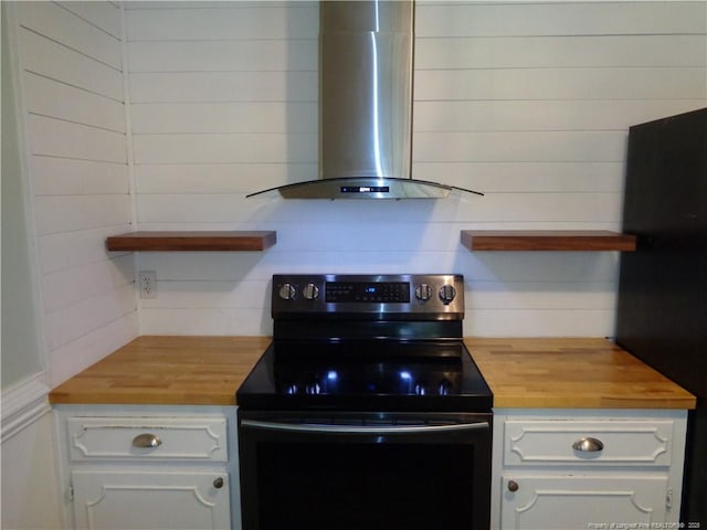 711 Fairview St, Fayetteville, NC 28312 - kitchen with black appliances, wooden counters, wall chimney exhaust hood, and open shelves