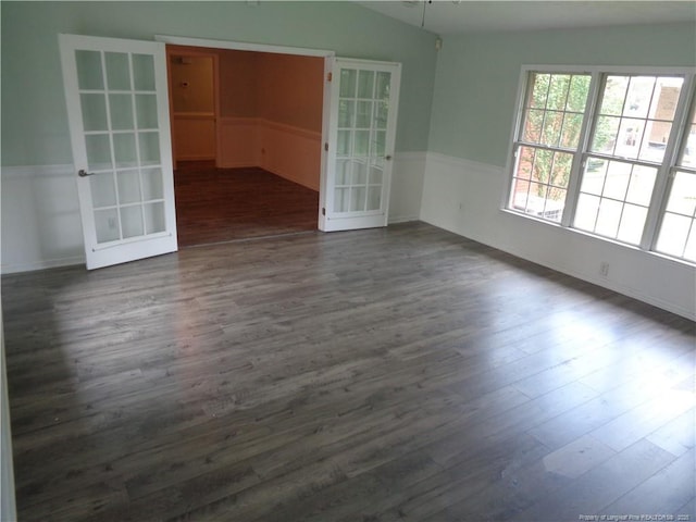 711 Fairview St, Fayetteville, NC 28312 - unfurnished room featuring french doors, dark wood-style floors, baseboards, and vaulted ceiling