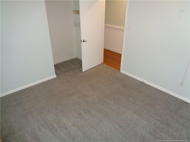 711 Fairview St, Fayetteville, NC 28312 - unfurnished bedroom with carpet flooring and baseboards