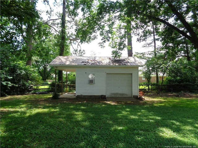 711 Fairview St, Fayetteville, NC 28312 - view of outdoor structure with a garage
