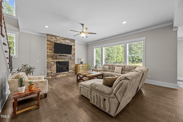 7410 Chouder Ln, Wake Forest, NC 27587 - living area with ornamental molding, a ceiling fan, dark wood-type flooring, a fireplace, and recessed lighting