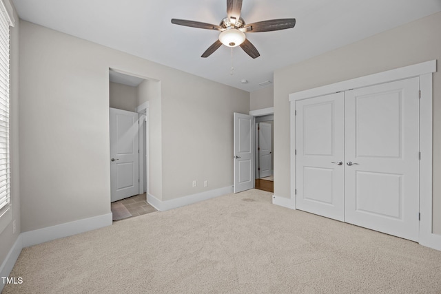 7410 Chouder Ln, Wake Forest, NC 27587 - unfurnished bedroom featuring carpet floors, a closet, and a ceiling fan