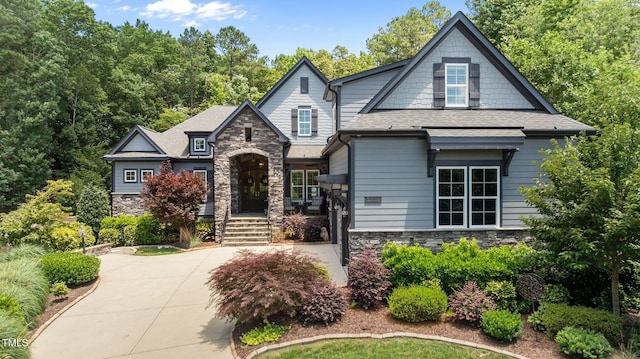 2112 Colin Hill Ct, Wake Forest, NC 27587 - view of front of house with stone siding, roof with shingles, and concrete driveway