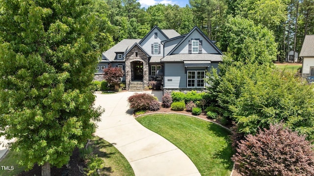 2112 Colin Hill Ct, Wake Forest, NC 27587 - view of front facade with stone siding and a front yard