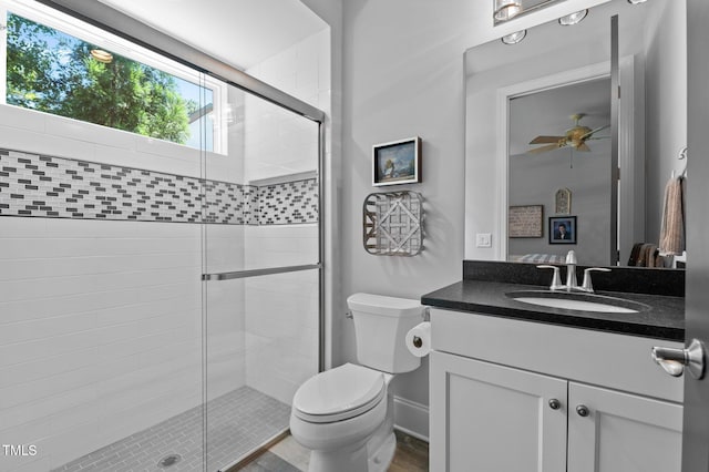 2112 Colin Hill Ct, Wake Forest, NC 27587 - full bath with vanity, a shower stall, connected bathroom, and ceiling fan