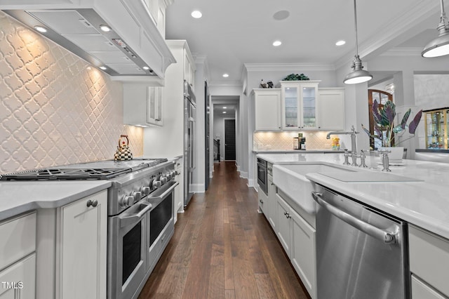 2112 Colin Hill Ct, Wake Forest, NC 27587 - kitchen with stainless steel appliances, range hood, crown molding, light countertops, and decorative backsplash