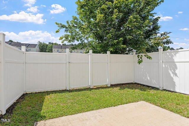 1109 Hadel Pl, Knightdale, NC 27545 - fenced backyard with a patio