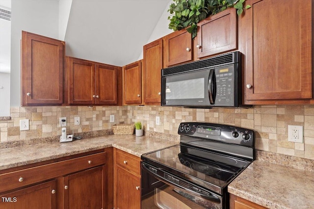1109 Hadel Pl, Knightdale, NC 27545 - kitchen with black appliances, light countertops, tasteful backsplash, lofted ceiling, and brown cabinetry