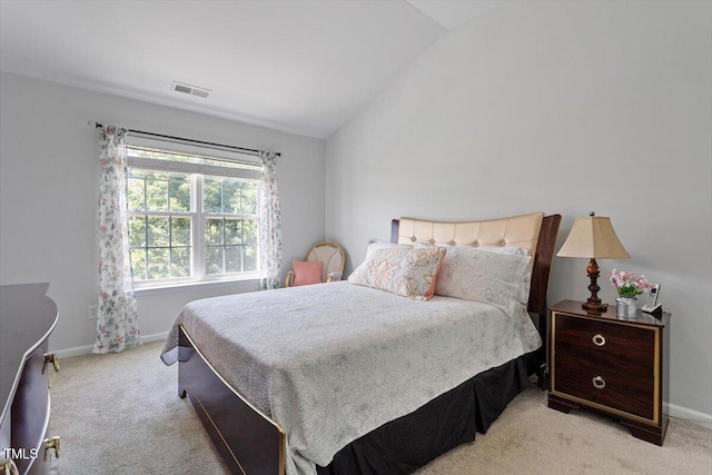 1109 Hadel Pl, Knightdale, NC 27545 - bedroom featuring light colored carpet and vaulted ceiling
