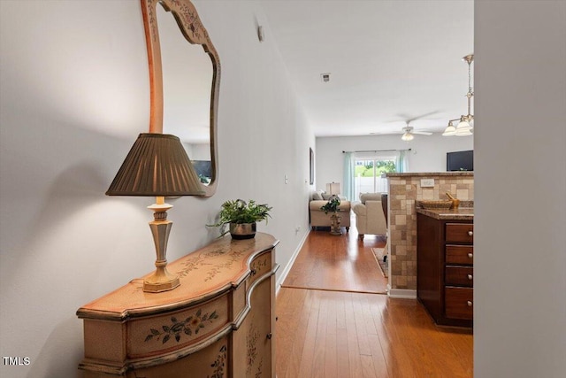 1109 Hadel Pl, Knightdale, NC 27545 - hallway with hardwood / wood-style floors