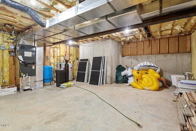 8415 Meadow View Ln, Bahama, NC 27503 - unfinished below grade area featuring a water pressure tank, a water softener, and heating unit