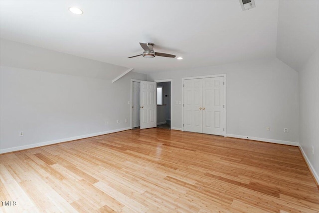 8415 Meadow View Ln, Bahama, NC 27503 - unfurnished bedroom featuring light wood finished floors, recessed lighting, a ceiling fan, and lofted ceiling
