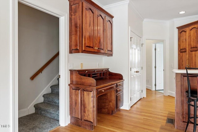 8415 Meadow View Ln, Bahama, NC 27503 - bar featuring light wood finished floors, stairs, ornamental molding, and recessed lighting