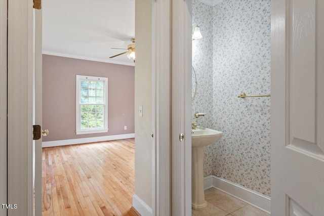 8415 Meadow View Ln, Bahama, NC 27503 - bathroom with ornamental molding, wallpapered walls, hardwood / wood-style flooring, and ceiling fan