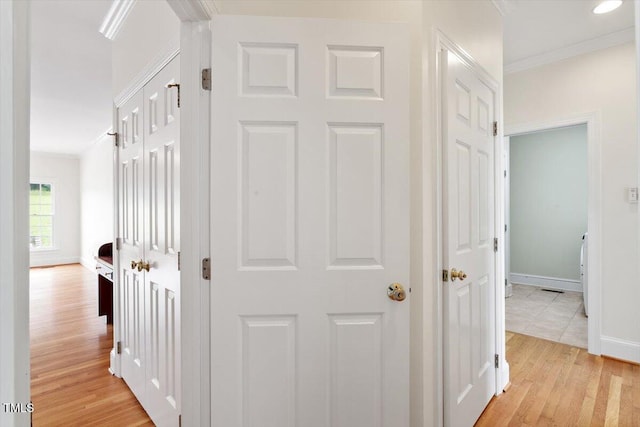 8415 Meadow View Ln, Bahama, NC 27503 - hallway with light wood-style floors and crown molding
