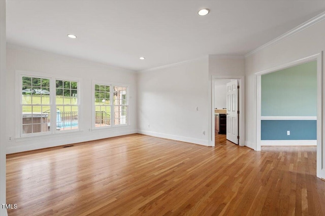 8415 Meadow View Ln, Bahama, NC 27503 - spare room with crown molding, light wood-type flooring, and recessed lighting