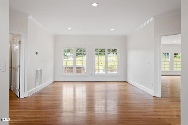 8415 Meadow View Ln, Bahama, NC 27503 - spare room featuring wood finished floors, crown molding, and recessed lighting