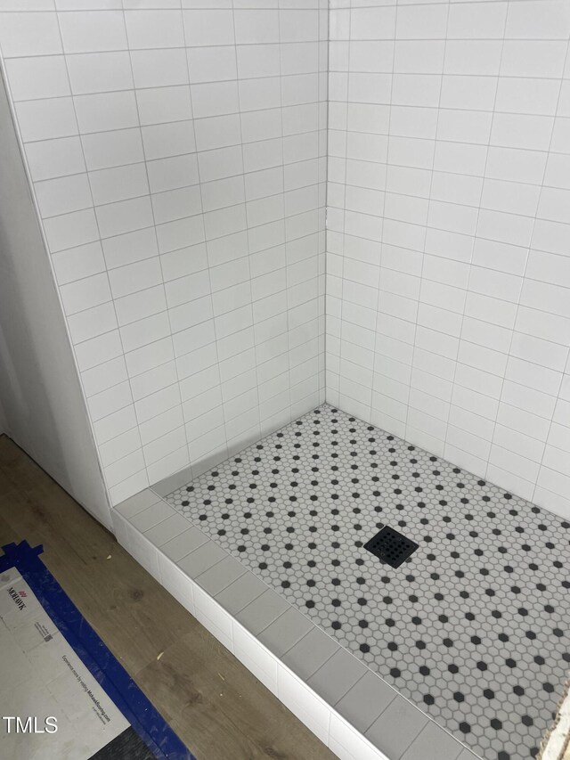 4035 King Charles Rd, Durham, NC 27707 - bathroom view of tiled shower and wood finished floors