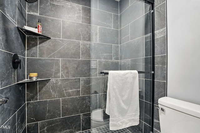 7708 Falcon Rest Cir, Raleigh, NC 27615 - full bathroom featuring tiled shower and toilet