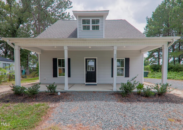 202 E S St, Fremont, NC 27830 - view of front of home with a porch and roof with shingles