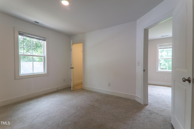 202 E S St, Fremont, NC 27830 - unfurnished room with carpet, healthy amount of natural light, and recessed lighting