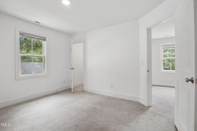 202 E S St, Fremont, NC 27830 - carpeted spare room with baseboards