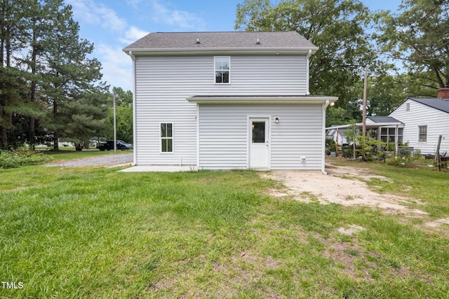 202 E S St, Fremont, NC 27830 - back of house featuring a yard