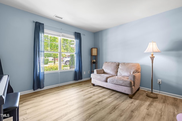 2011 Unbridled Dr, Knightdale, NC 27545 - sitting room with wood finished floors and baseboards