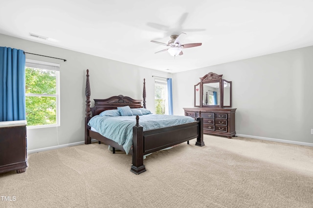 2011 Unbridled Dr, Knightdale, NC 27545 - carpeted bedroom with baseboards and ceiling fan