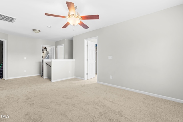 2011 Unbridled Dr, Knightdale, NC 27545 - unfurnished room featuring light colored carpet, baseboards, and ceiling fan