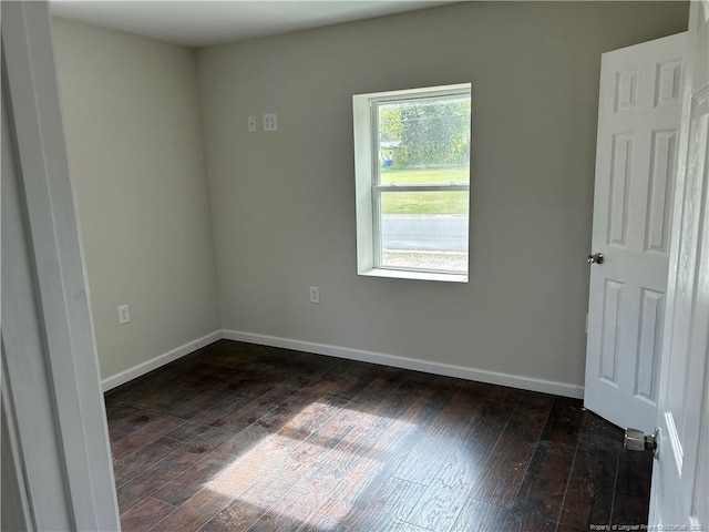 1914 Slater Ave, Fayetteville, NC 28301 - empty room with dark wood-style flooring and baseboards