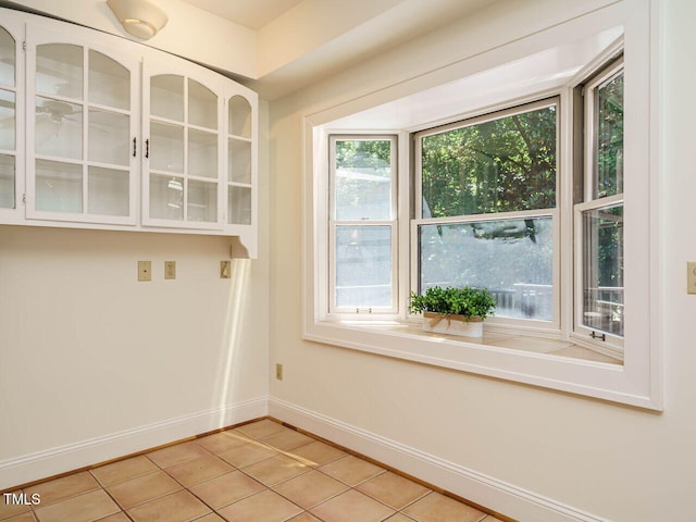 907 W Johnson St, Raleigh, NC 27605 - washroom featuring light tile patterned floors and healthy amount of natural light