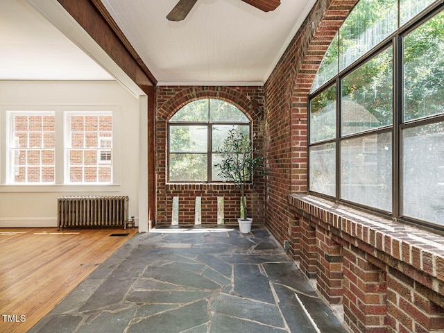 907 W Johnson St, Raleigh, NC 27605 - unfurnished sunroom with radiator and ceiling fan